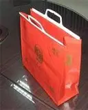 Handle bags for garment packing